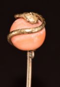 Victorian stick pin in the form of a serpent wrapped around a coral bead, 3.1g