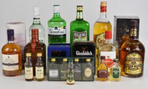 A collection of mixed spirits and liqueurs to include Chivas Regal, Bacardi, Cointreau, Gordon's Gin