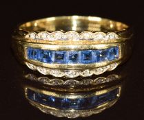 An 18k gold ring set with sapphires and diamonds, 3.6g, size R