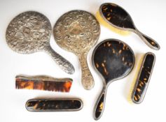 Hallmarked silver and faux tortoiseshell dressing table set comprising hand mirror and two brushes
