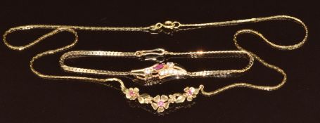 A 9ct gold necklace set with rubies (4.2g, 44cm) and a 14k gold bracelet set with a ruby and