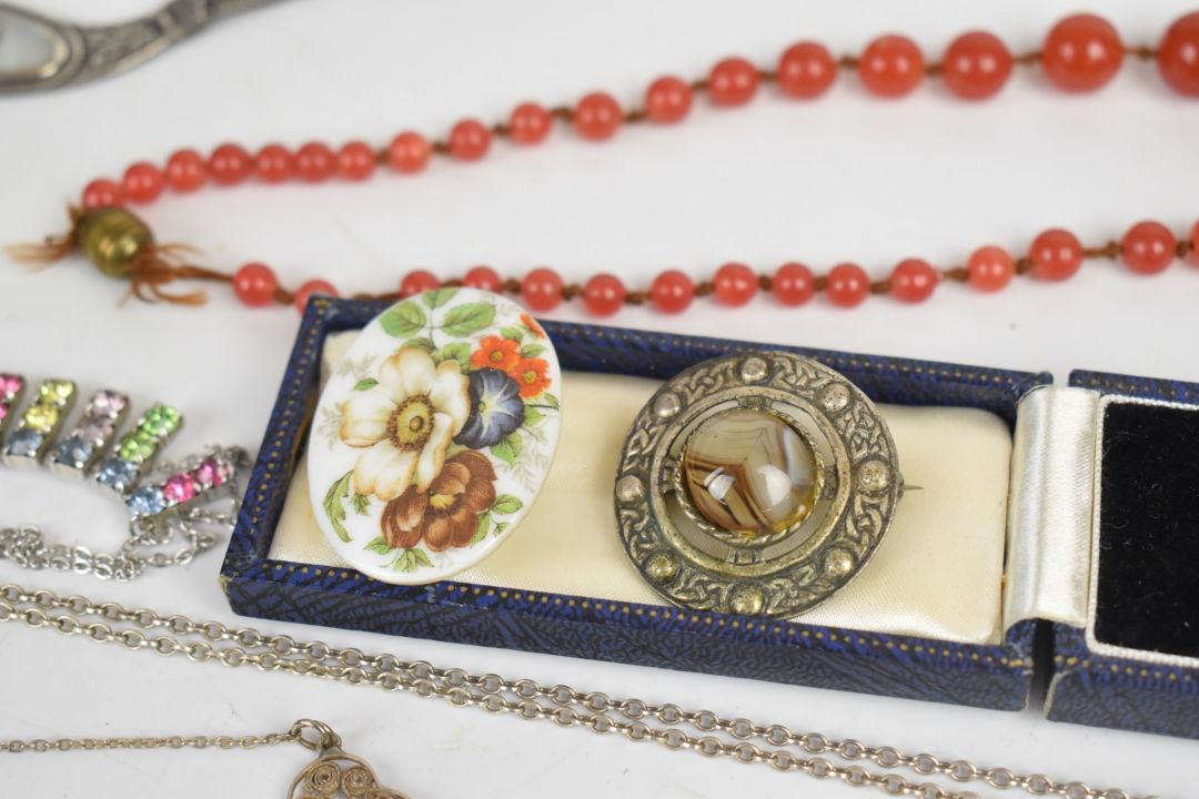 A collection of jewellery including two silver bangles, curb link bracelet with heart padlock clasp, - Image 6 of 8