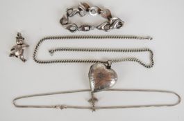 Silver heart locket on silver curb link necklace, silver bracelet, silver snake chain and teddy-bear