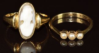 Two 9ct gold rings, one set with three split pearls, the other with a cameo, 5.3g, size M & O