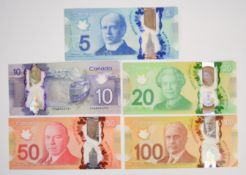 Five Canada 2011-15 polymer banknotes comprising $5, $10, $20, $50 and $100