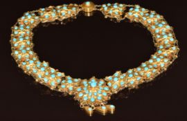 A yellow metal necklace set with turquoise, 46.9g