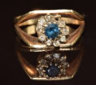 A 9ct gold ring set with a sapphire surrounded by diamonds, 2.9g, size M