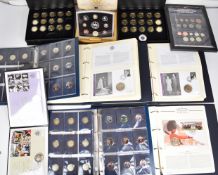 A large collection of coin covers in multiple albums, Change Checker albums with modern coinage,