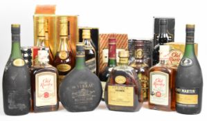 Twelve bottles of spirits and Port to include Hennessy Cognac, Marquis de Vibrac Napoleon
