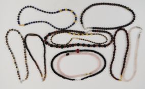 Ten beaded necklaces including agate, rose quartz, garnet, lapis lazuli, etc