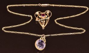 A 9ct gold chain with barrel clasp and two Edwardian 9ct gold pendants, one set with an oval