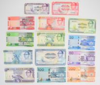 Fourteen The Gambia banknotes including three sets (1987 issue, 1989-91 issue and 2019 issue)