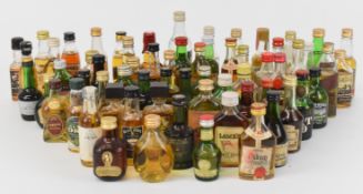 Over sixty Whisky, Rum, Gin and similar miniatures to include Oban, Laphroaig, Cardhu, Crawford's,