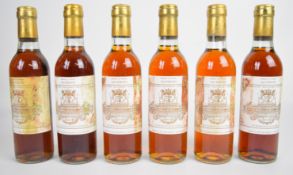 Six bottles of Chateau Filhot Sauternes 1983, 37.5cl. PLEASE NOTE ALL ALCOHOL & TOBACCO ITEMS ARE