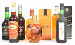 Seven bottles of Port and mixed spirits to include Cockburn's 10 Year Tawny Port, Isle of Jura