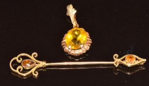 A 9ct gold jabot pin/ pin set with a paste (6.2cm, 2.4g) and a 10k gold pendant set with paste (2.