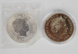 1998 silver Britannia coin together with a 2009 £5 coin commemorating Concorde supersonic flight