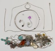 A collection of silver necklaces and pendants including pressed amber, turquoise, shell, etc, 200g