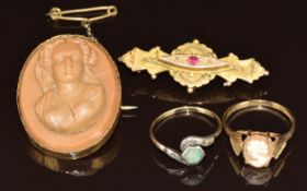 A 9ct gold brooch (Birmingham 1905, 2.9g), 9ct gold and silver ring, 9ct gold ring set with a