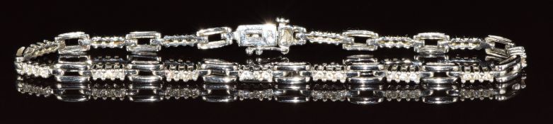 A 9ct white gold bracelet set with paste, 6.2g, 18cm