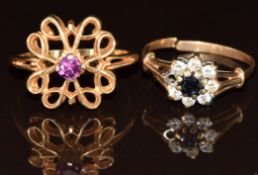 Two yellow metal rings, one set with a spinel and the other a sapphire surrounded by cubic
