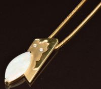 An 18k gold pendant set with a marquise cut opal and two diamonds in an abstract design (4.2cm),