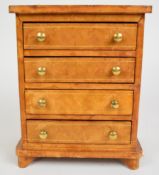 Liberty miniature leather jewellery chest of four straight drawers with embossed 'Made in Italy