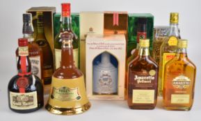 Fifteen bottles of mixed liqueurs and spirits to include Remy Martin Cognac 40% 68cl, Harvey's
