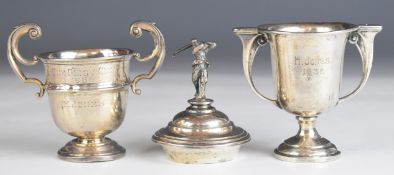 Two hallmarked silver twin handled trophy cups, one with golfer finial and Springfield Park Golf
