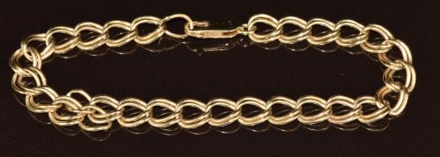A 9ct gold double curb link bracelet, 9.7g, 19cm