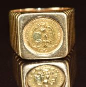 A 14k gold ring set with a gold coin, 11.4g, size R