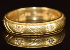 An 18ct gold eternity ring set with diamonds, 4.3g, size K