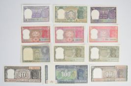 Twelve India banknotes including 1940 King George VI 1 Rupee with green serial number, 1970 5 Rupees