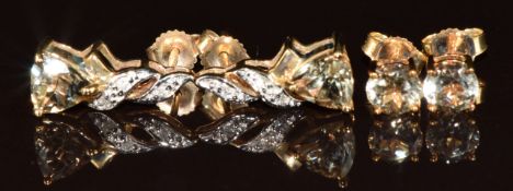 Two pairs of 9k gold earrings both set with zultanite, one pair also set with additional diamonds,