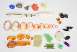 Ten loose shell cameos, two smoky quartz, pressed amber cabochons, carved coral flower, two round