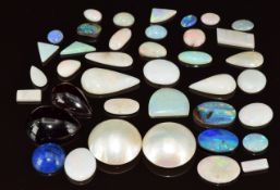 Two pear cut garnet cabochons (totalling approximately 15.7g), two pearl cabochons, lapis lazuli