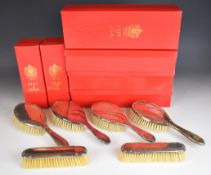Six various hallmarked silver mounted brushes, all in Kent of London boxes, where the vendor's