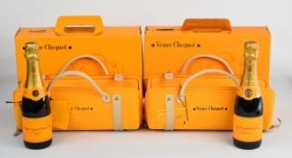 Two Veuve Clicquot City Traveller Champagne and chiller bag sets each containing 375ml bottle of