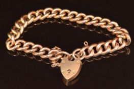 A 9ct rose gold curb link bracelet with heart padlock clasp, 15.3g