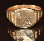 A 9ct gold signet ring set with a diamond, 5g, size U