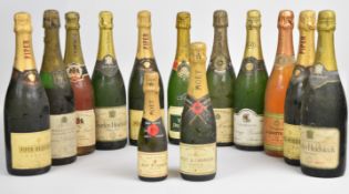 Thirteen bottles of vintage Champagne to include Piper-Heidsieck, Bollinger, Moët & Chandon,