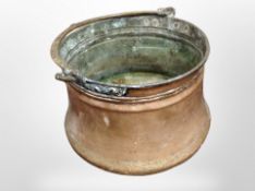A 19th century copper swing handled cooking pot,
