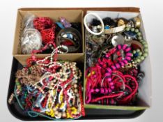 A collection of costume jewellery, brass bangles,