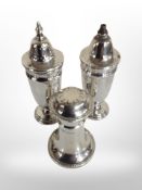 Three silver sifters, tallest 10.