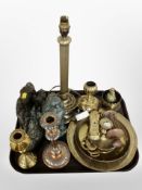 A group of brass wares, plates, lamp base,