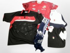 A Newcastle Falcons rugby shirt bearing team signatures,