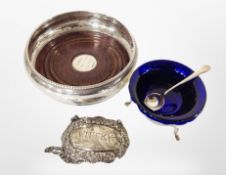 A silver mounted bottle coaster,