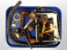 A collection of pipes including meerschaum pipe with bowl in the form of a Sikh wearing a turban,