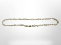 A triple faux pearl necklace