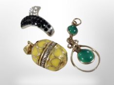 Three silver pendants